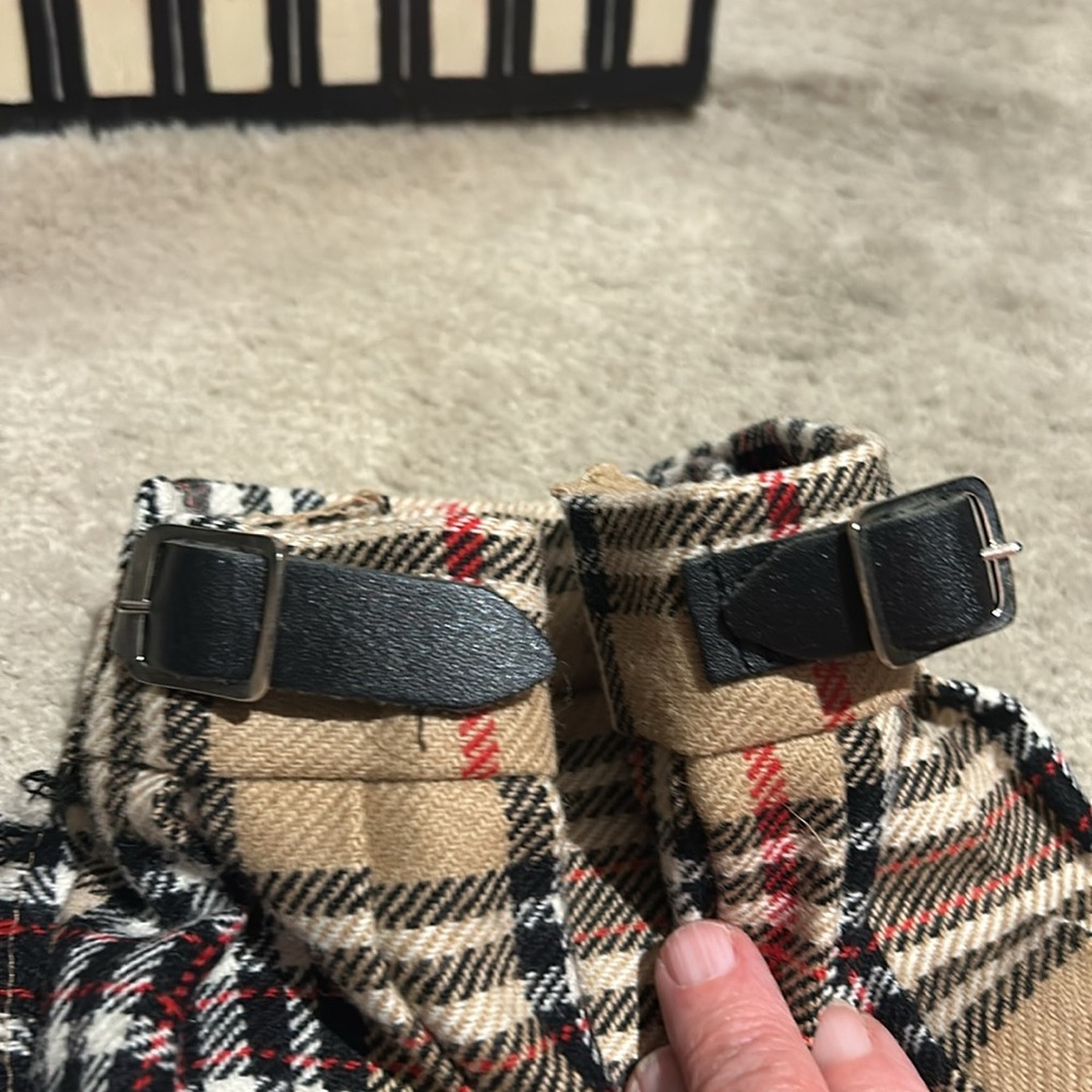 Toddler plaid skirt measures approximately 10 1/2 inches across the waist. - Picture 6 of 8